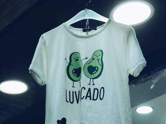 White t-shirt with avocado graphic and text