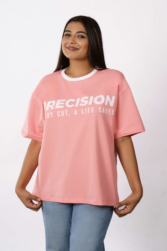 A woman in a pink t-shirt with text